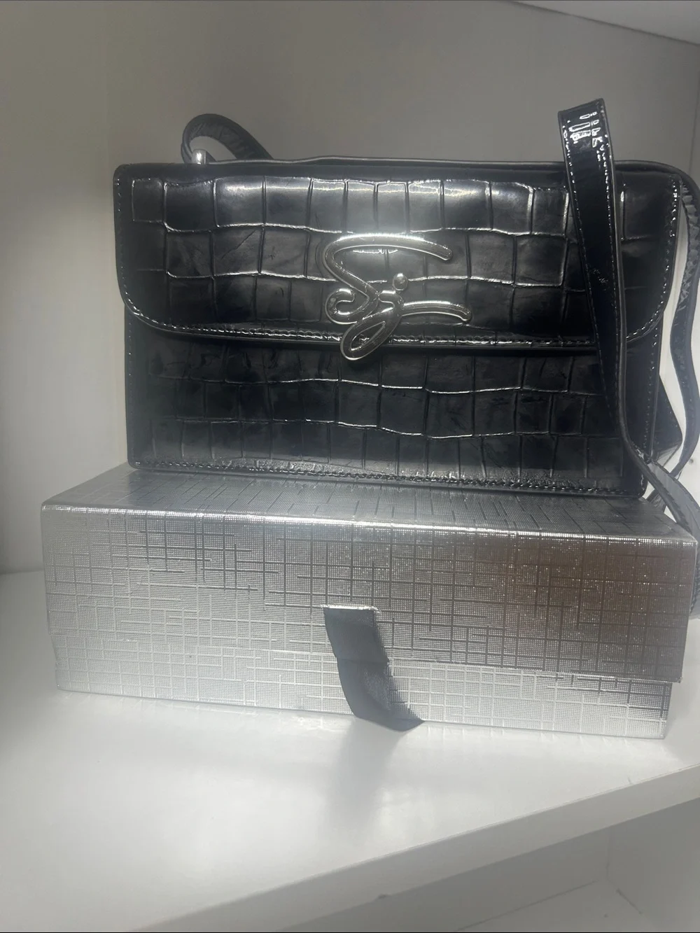 Black Croc-Embossed Crossbody Bag with Metal Script Emblem